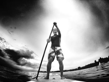 Silhouette of woman standing on beach