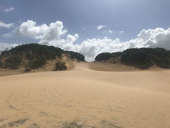 Scenic view of desert against sky