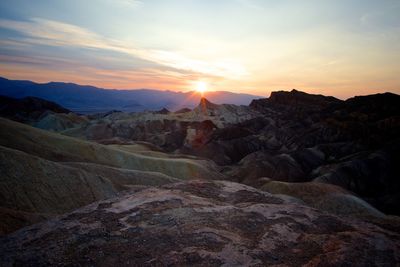 Scenic view of mountains at sunset