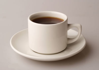 Close-up of coffee cup on table