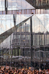 Reflection of buildings on glass window