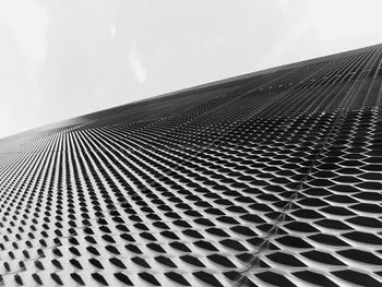 Close-up of modern building against sky