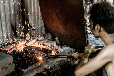 High angle view of people working on wooden floor