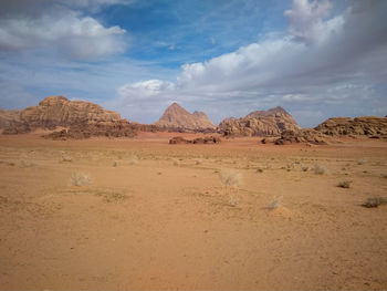 Panoramic view of desert against sky