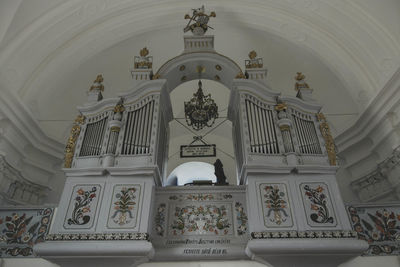 Low angle view of ornate ceiling