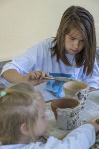 Mother and daughter at home