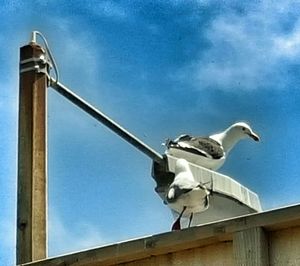 Low angle view of built structure against blue sky
