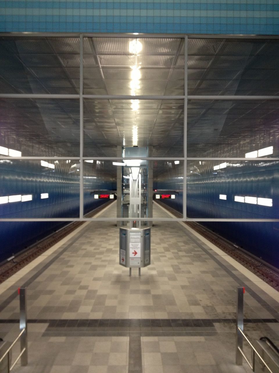 indoors, railroad station, railroad station platform, transportation, public transportation, illuminated, subway station, rail transportation, railroad track, ceiling, train - vehicle, subway, built structure, travel, architecture, subway platform, transportation building - type of building, station, mode of transport, public transport