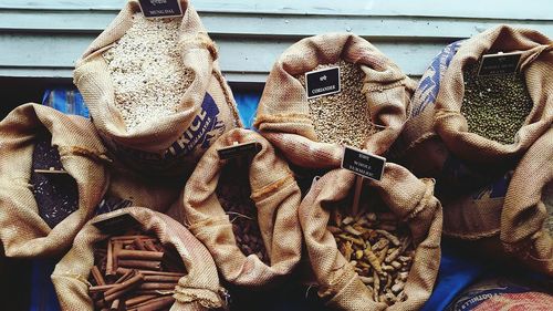 Directly above shot of spices and grains for sale at shop