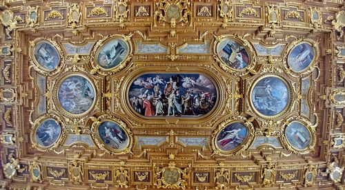 Low angle view of ornate ceiling of building