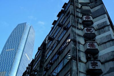 Low angle view of skyscrapers against sky