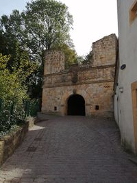 Entrance of historic building against sky