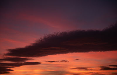 Low angle view of dramatic sky during sunset