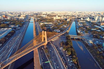High angle view of bridge in city against sky