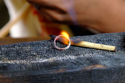 Close-up of stick burning