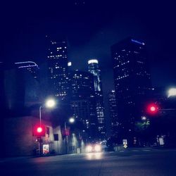 Illuminated street light at night