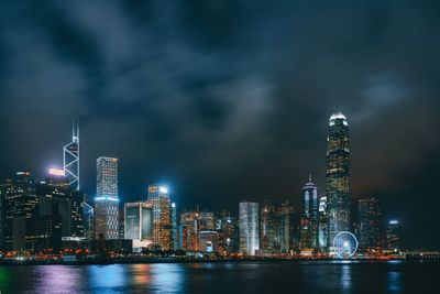 Illuminated city lit up at night