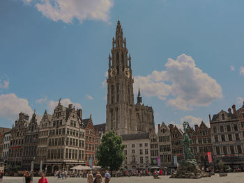 Buildings in city against sky