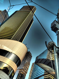 Low angle view of modern building against sky