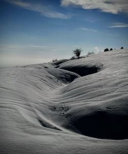 Scenic view of desert against sky