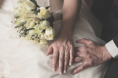 Close-up of hand holding flower