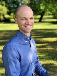 Portrait of smiling man in park