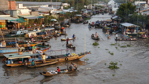 High angle view of people on boats in canal