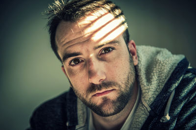 Close-up portrait of mid adult man