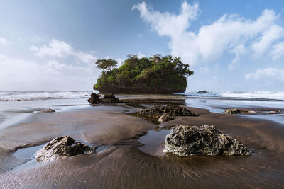 Scenic view madasari beach with blue sky