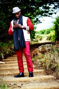 Full length of man standing on field