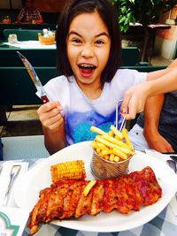 High angle view of woman eating food