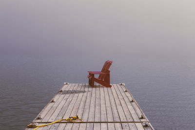 Pier over sea against sky