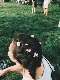High angle view of women on grassy field