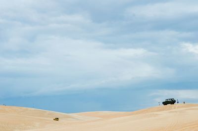 Scenic view of desert against sky