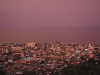 High angle view of buildings in city against clear sky