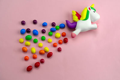 High angle view of multi colored candies on table