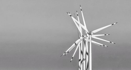 Low angle view of windmill against clear sky