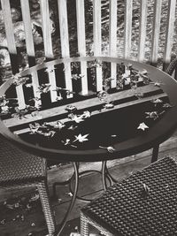 High angle view of empty chairs and tables in building