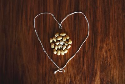 Close-up of heart shape on table