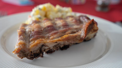 High angle view of meat on barbecue grill