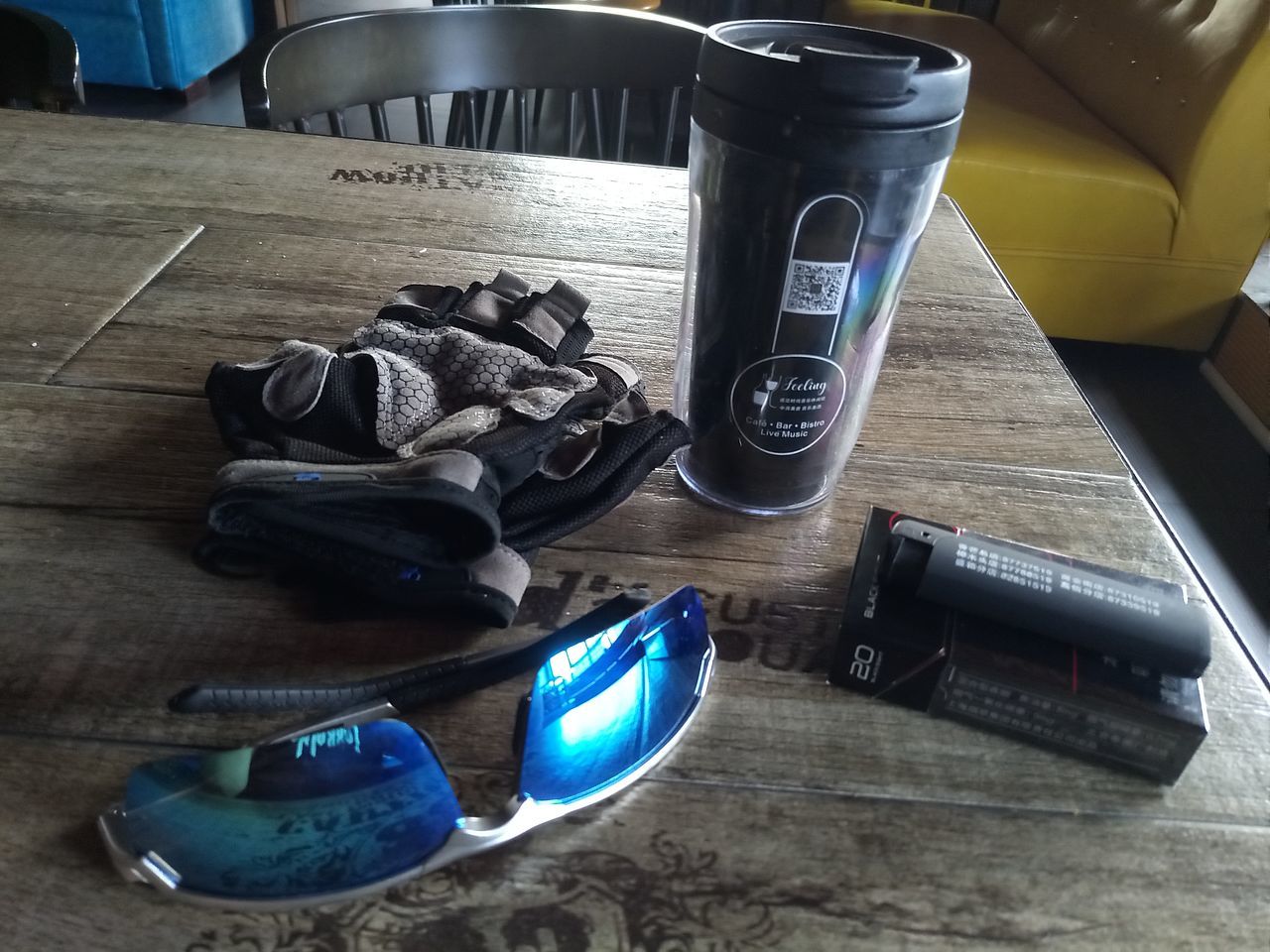 indoors, container, table, no people, still life, wood - material, high angle view, flooring, bottle, home interior, shoe, food and drink, close-up, communication, technology, domestic room, wood, food, black color, absence