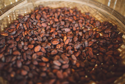 Close-up of cocoa beans on table