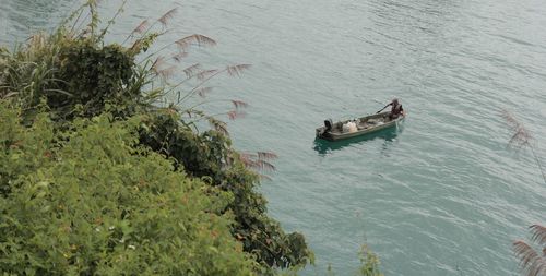 High angle view of ship sailing in sea