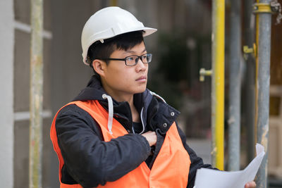 Architect working at construction site
