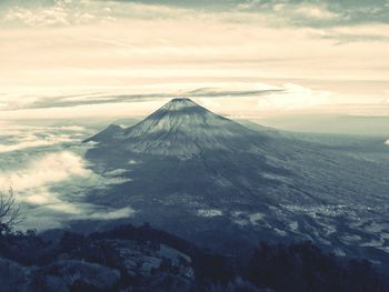 Aerial view of landscape against cloudy sky