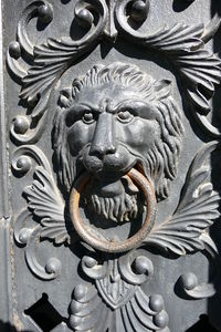 Close-up of sculpture on door