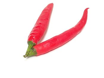 Close-up of strawberry over white background