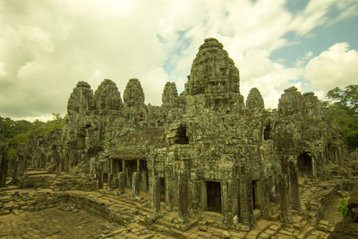 Old ruins of building against sky
