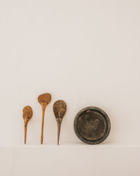 Directly above shot of cake on table against white background