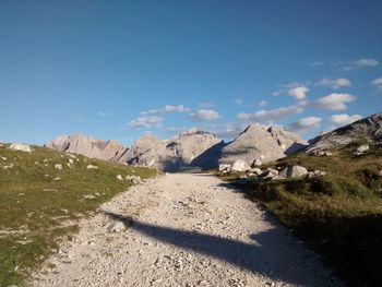 Scenic view of landscape against cloudy sky